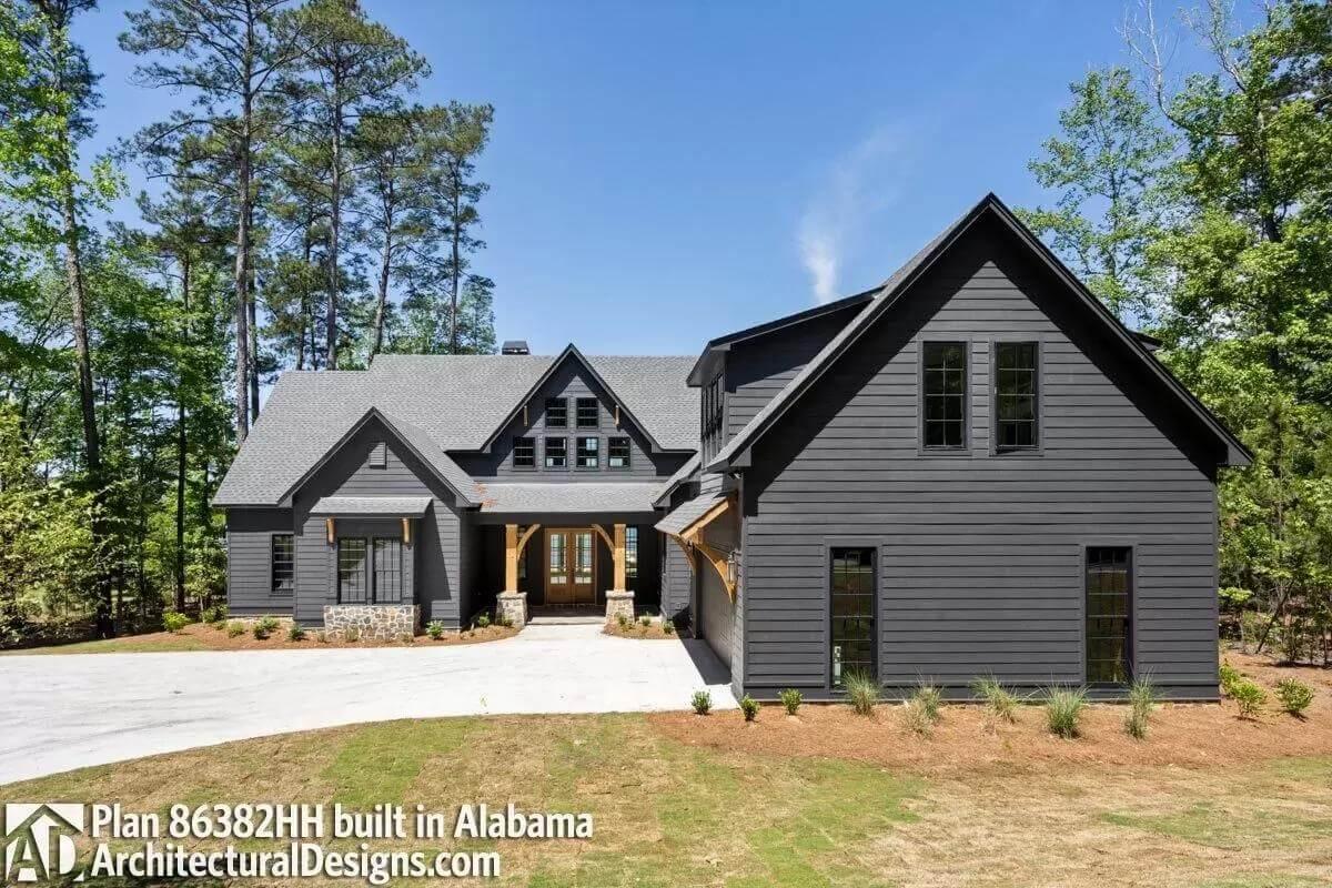 Check Out This Craftsman Home with Striking Dark Siding and Gabled Roof
