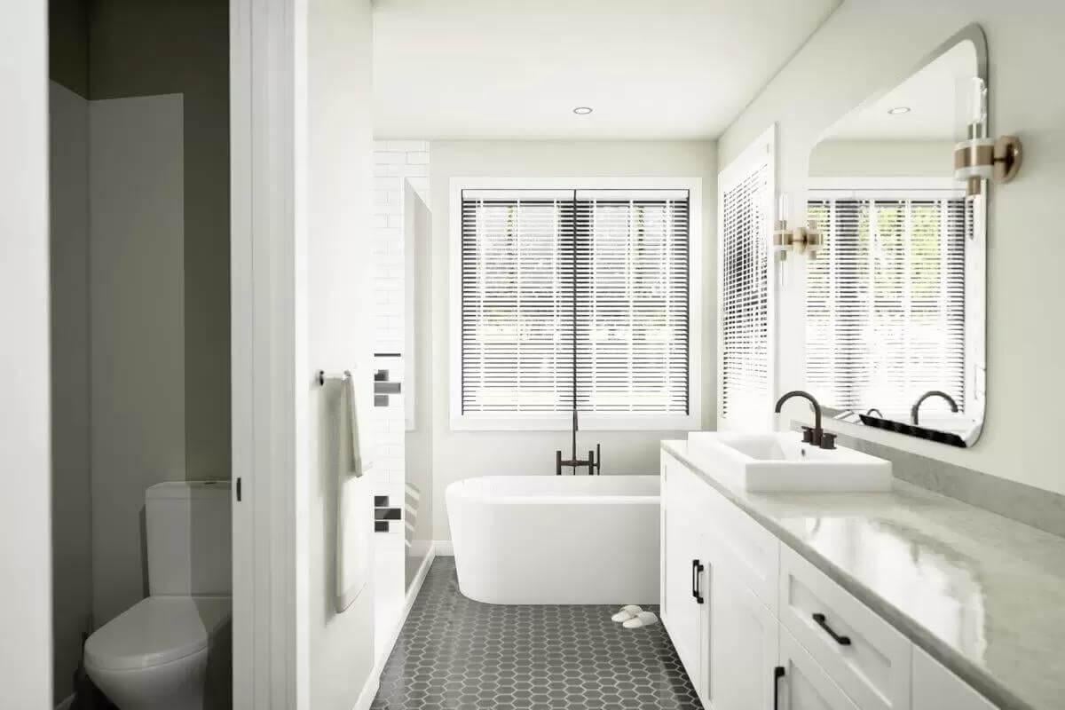 Explore the Minimalist Vibes in This Bathroom with a Freestanding Tub