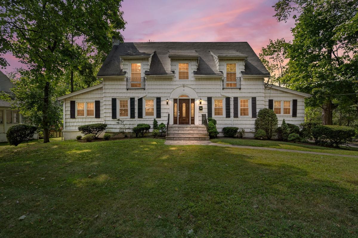 Classic Colonial Exterior with Symmetrical Charm in the Twilight