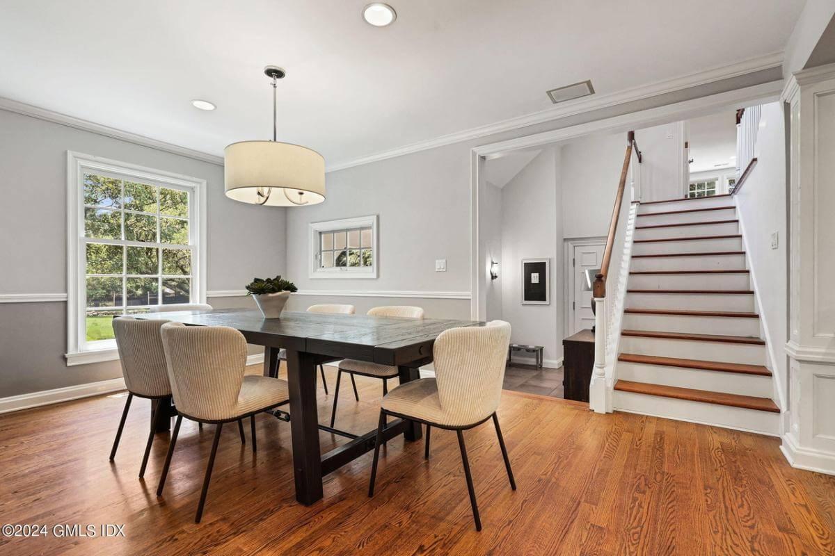 Sophisticated Dining Room with Bold Trellis Chandelier