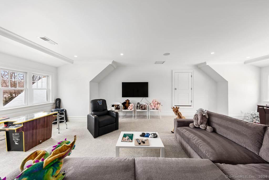 Family Game Room with Cozy Seating and Entertainment Zone