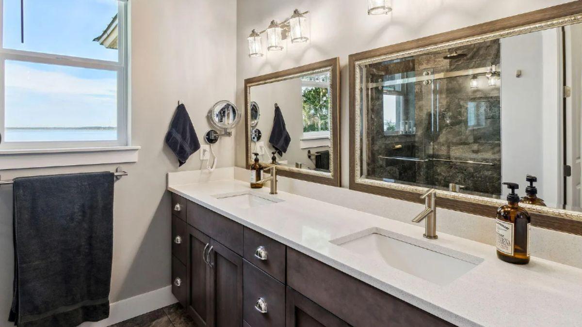 Discover Dual Vanities and Coastal Views in This Elegant Bathroom