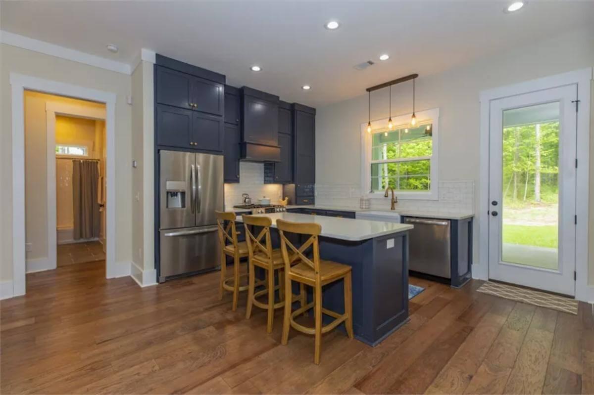 Check Out These Navy Cabinets Adding Depth to a Craftsman Kitchen