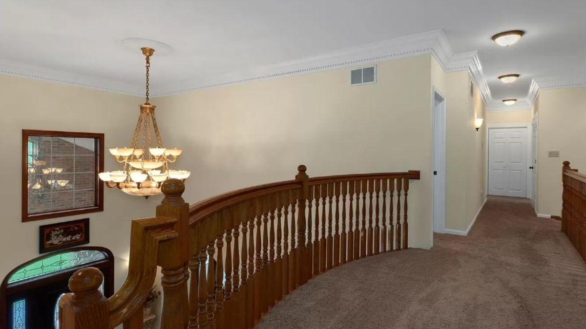 Classic Charm with This Curved Wood Balcony