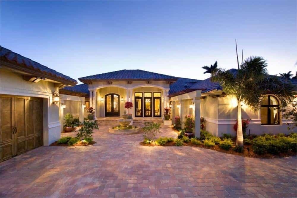 Mediterranean Charm with a Majestic Courtyard Entrance
