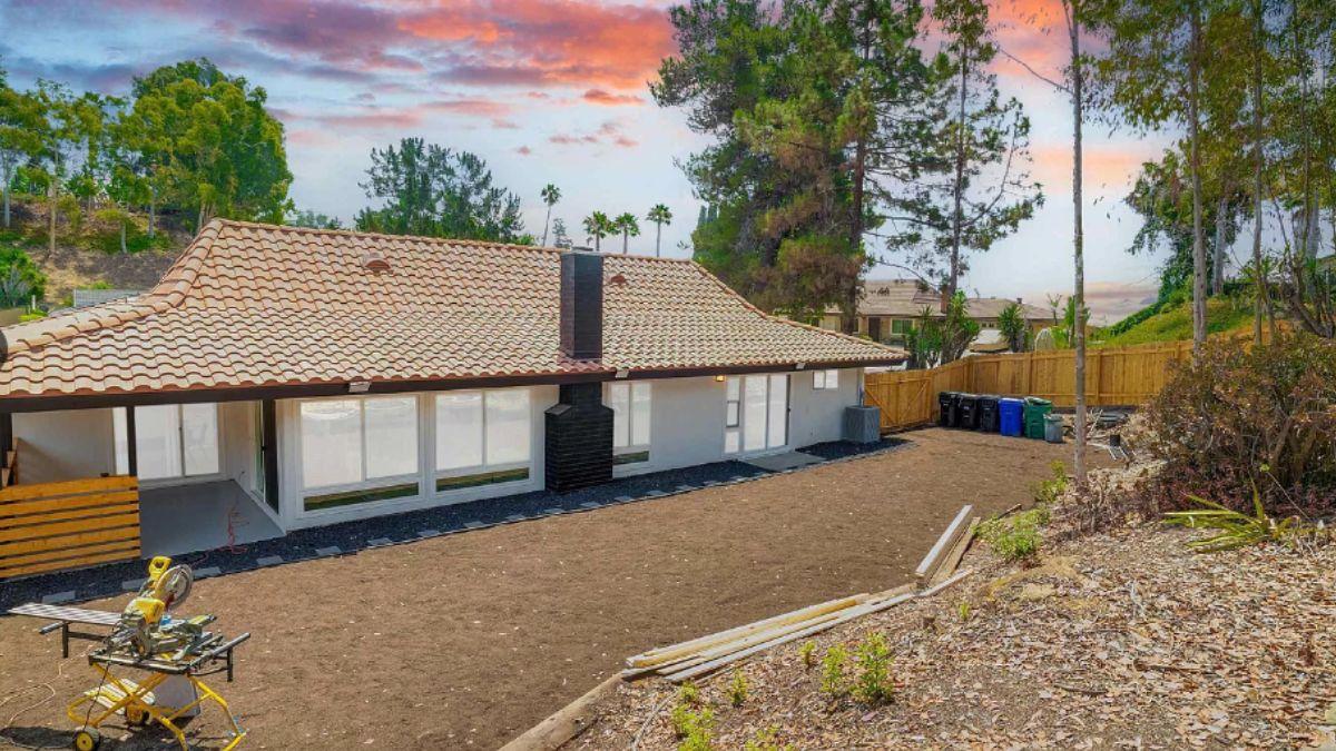 Check Out the Expansive Patio Under This Terra-Cotta Roof