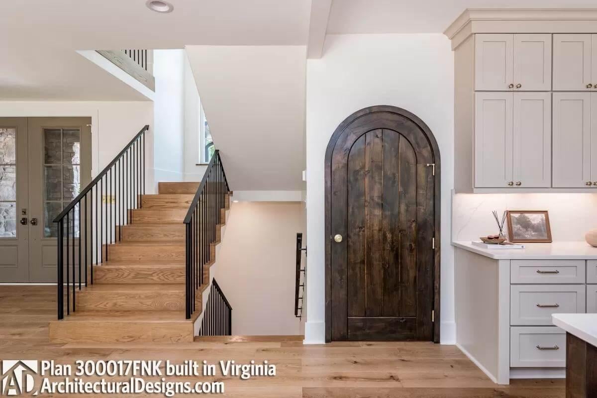 Notice the Wooden Arch Door Adding Character to This Modern Craftsman Interior