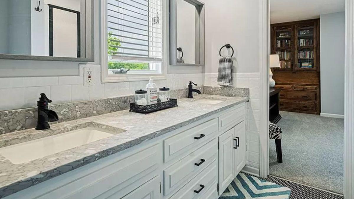 Dual Sinks and Marble Elegance: A Bathroom Retreat
