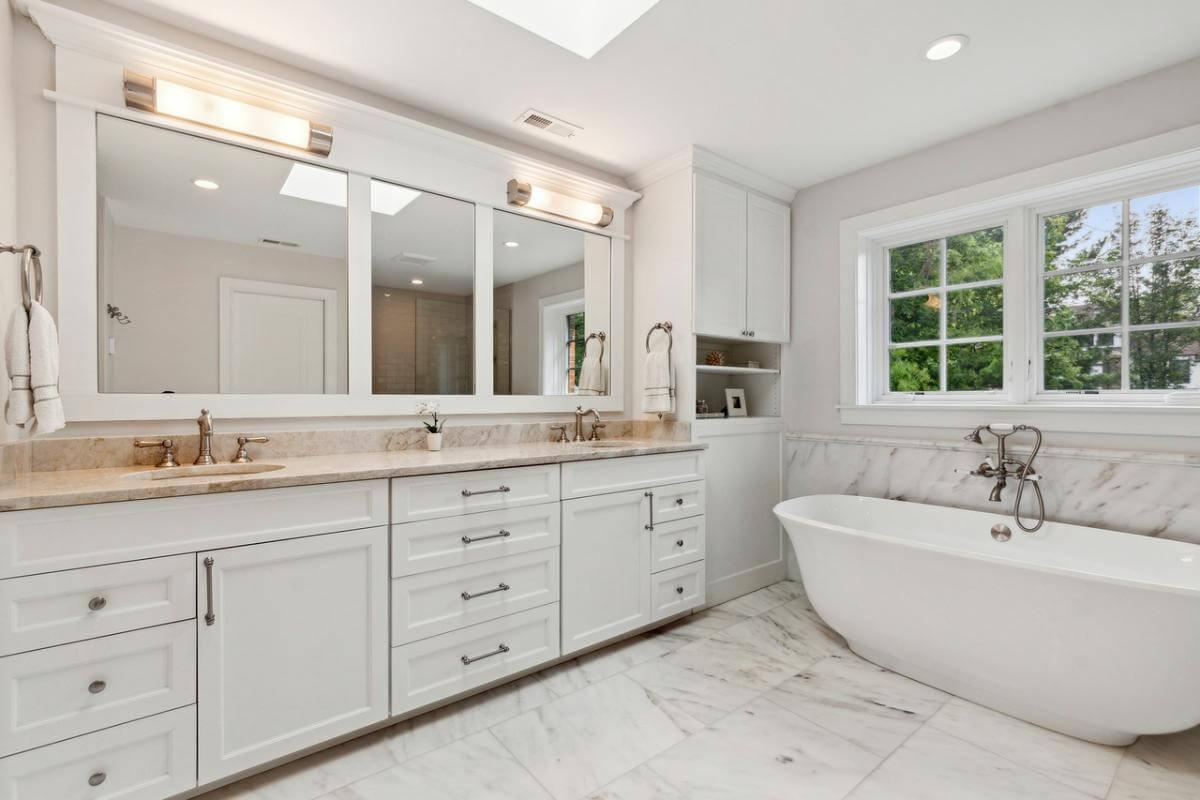 Bright Bathroom Oasis with a Freestanding Tub