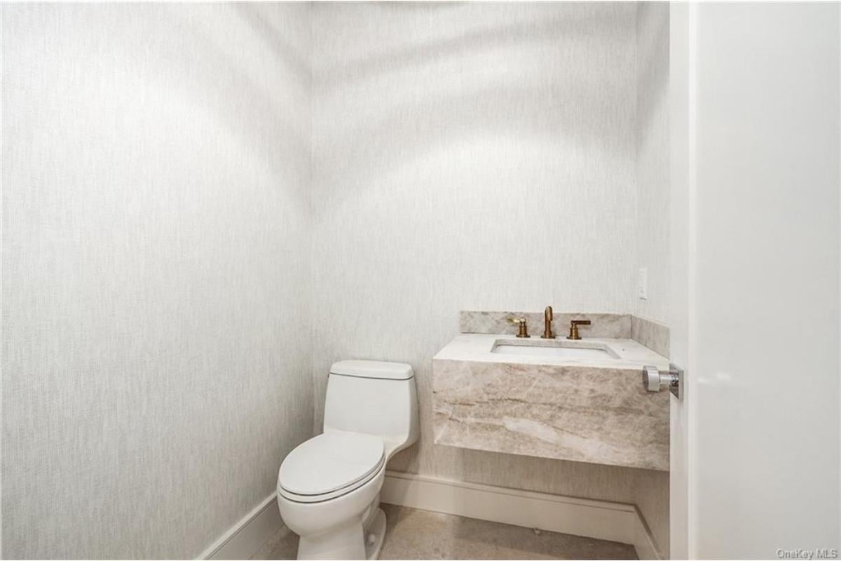 Streamlined Powder Room with a Sleek Floating Vanity