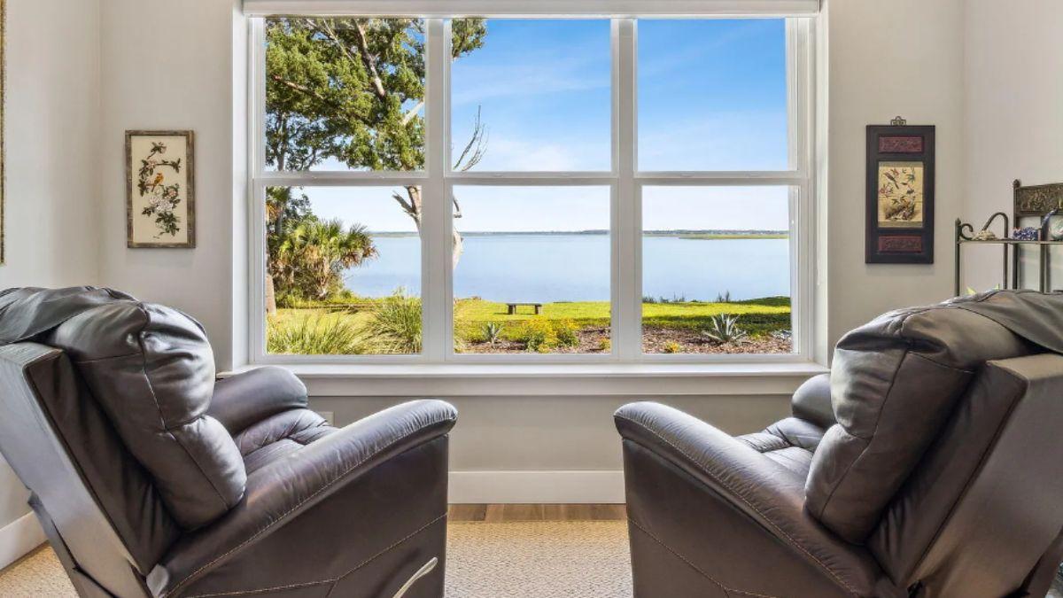 Relax with Panoramic Window Views in This Leather-Clad Lounge
