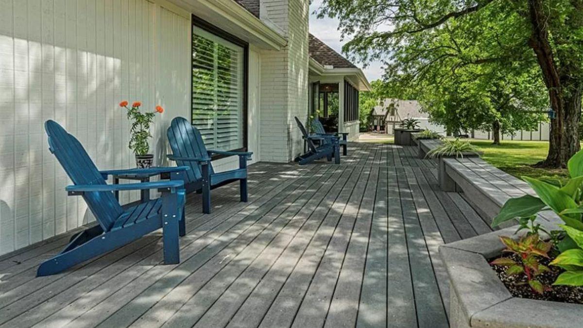Settle Into This Spacious Deck with Built-In Seating for Year-Round Enjoyment