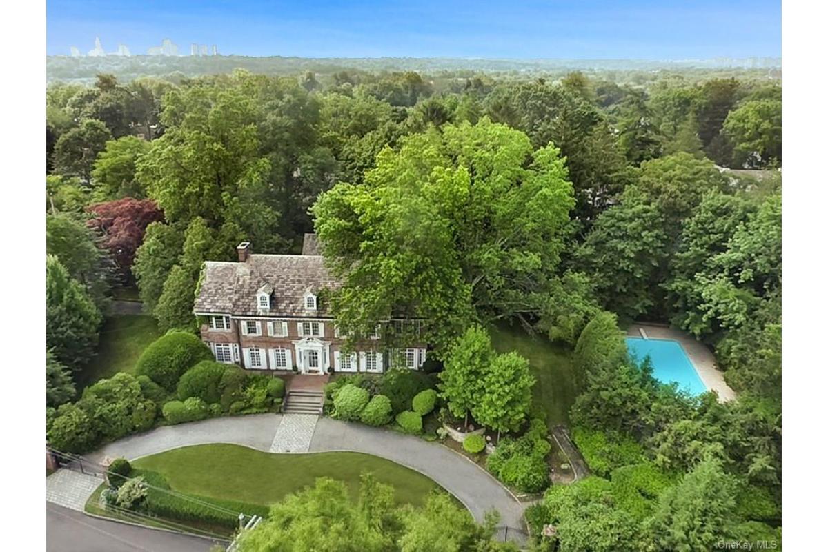 Majestic Estate with a Serene Garden and Pool View