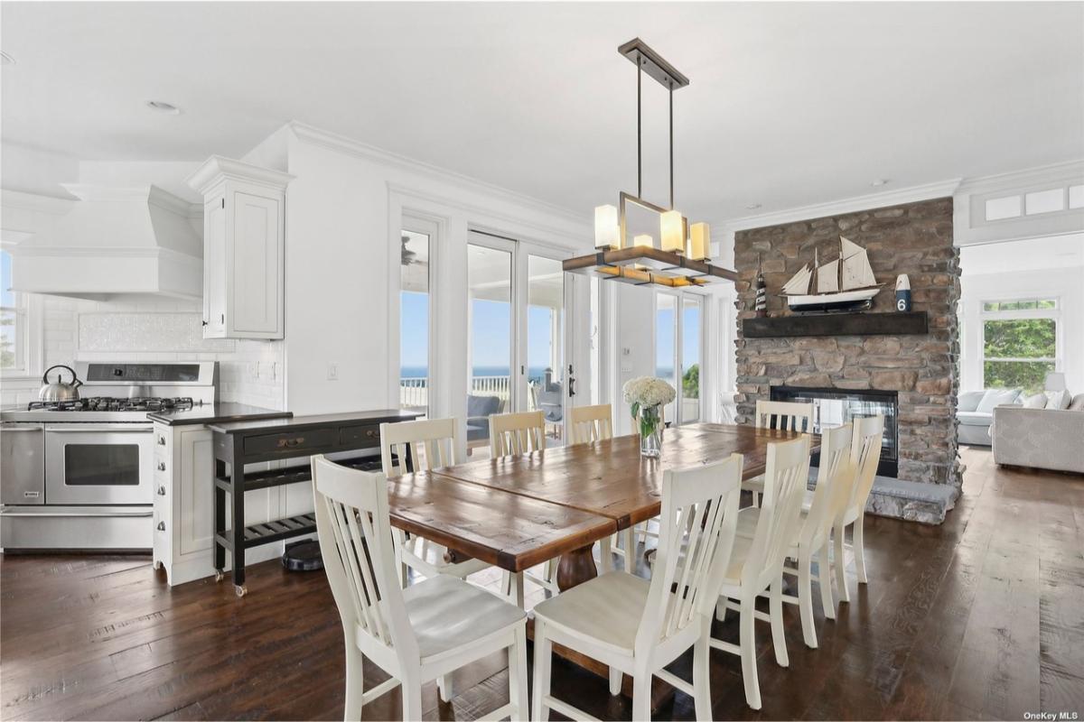 Coastal Dining with a Rustic Touch - Check Out the Stone Fireplace