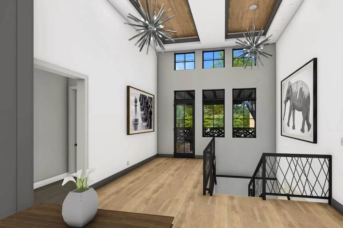 Striking Foyer with Bold Artwork and Unique Lighting Fixtures