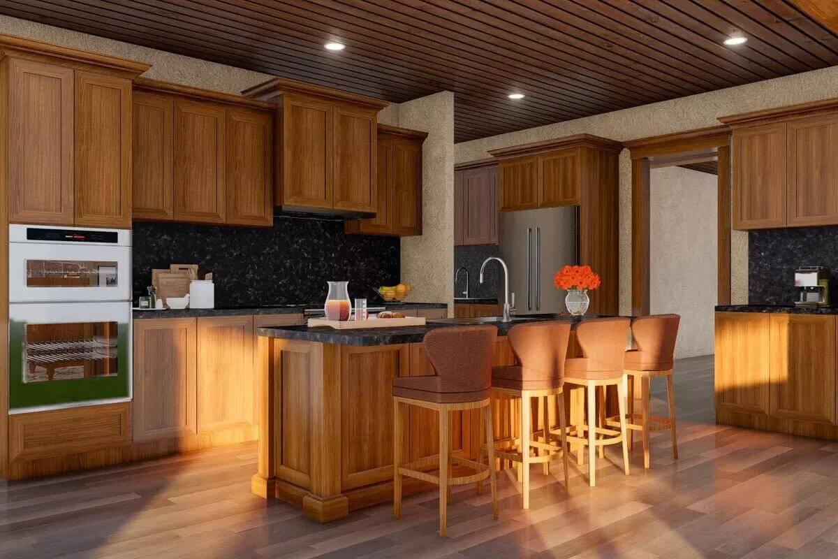 Warm Wooden Cabinets and Striking Dark Countertops Define This Kitchen
