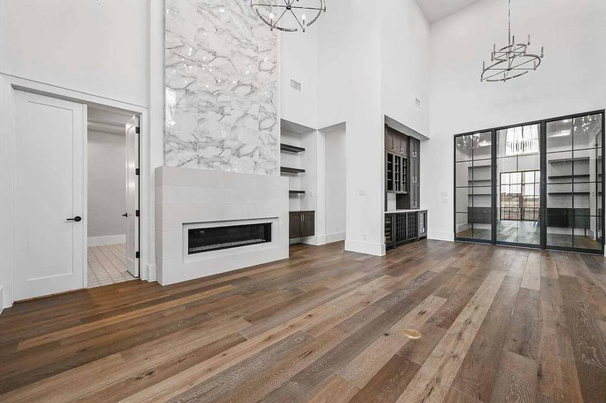 Take a Look at the Stunning Marble Accent Wall in This Living Area