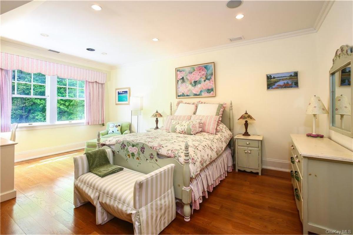 Charming Bedroom with Pastel Hues and Floral Accents