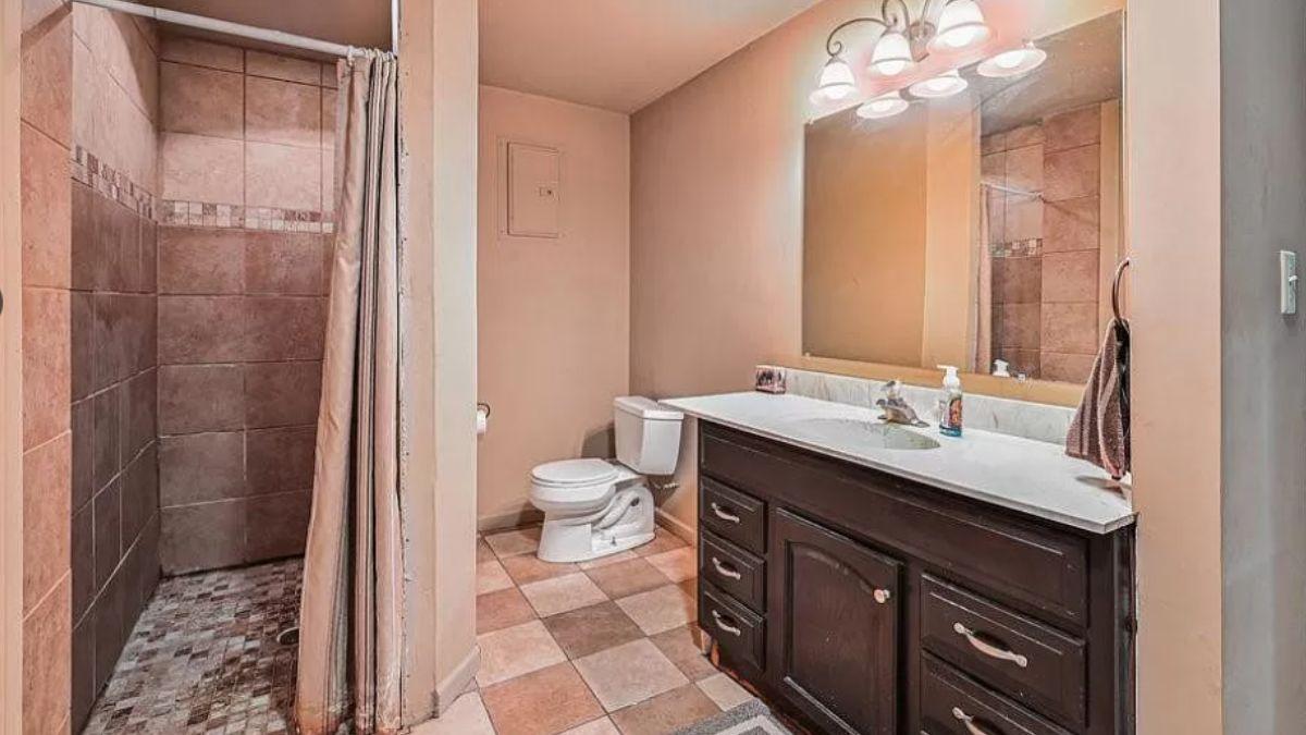 Notice the Practical Layout of This Rustic Bathroom