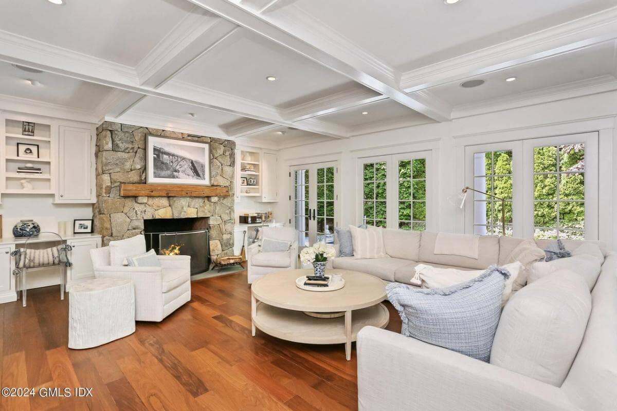 Craftsman Living Room with a Stone Hearth and Coffered Ceilings