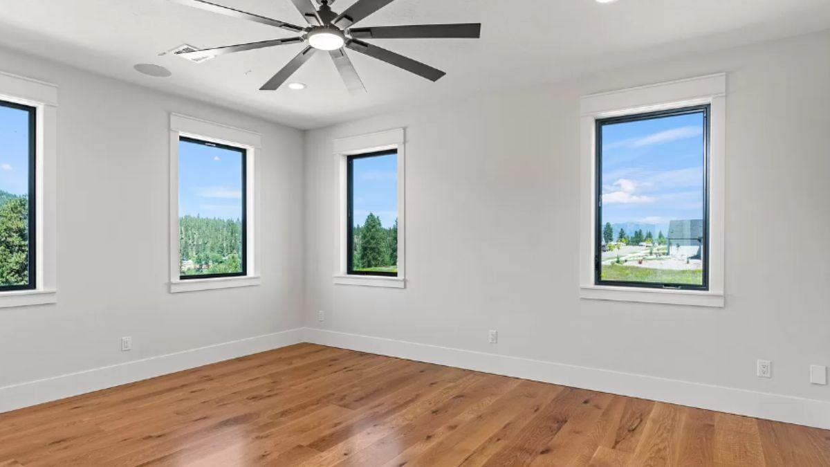 Spot the Oversized Ceiling Fan in This Bright Room