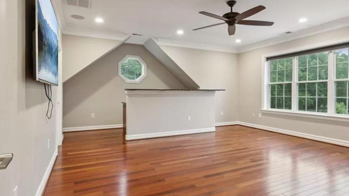 Spot the Unique Octagonal Window in This Versatile Room