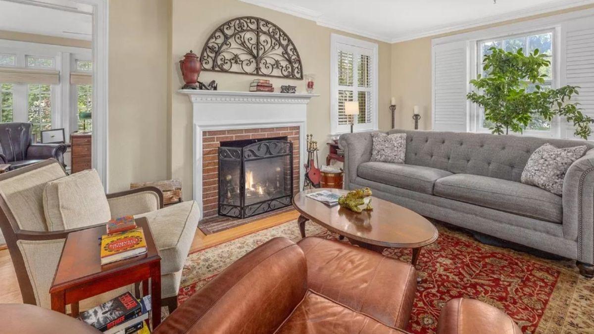 Cozy Living Room with Fireplace and Rich Leather Accents