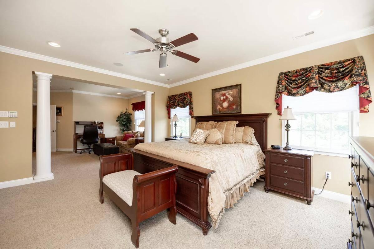 Spacious Master Suite with a Reading Nook for Relaxation