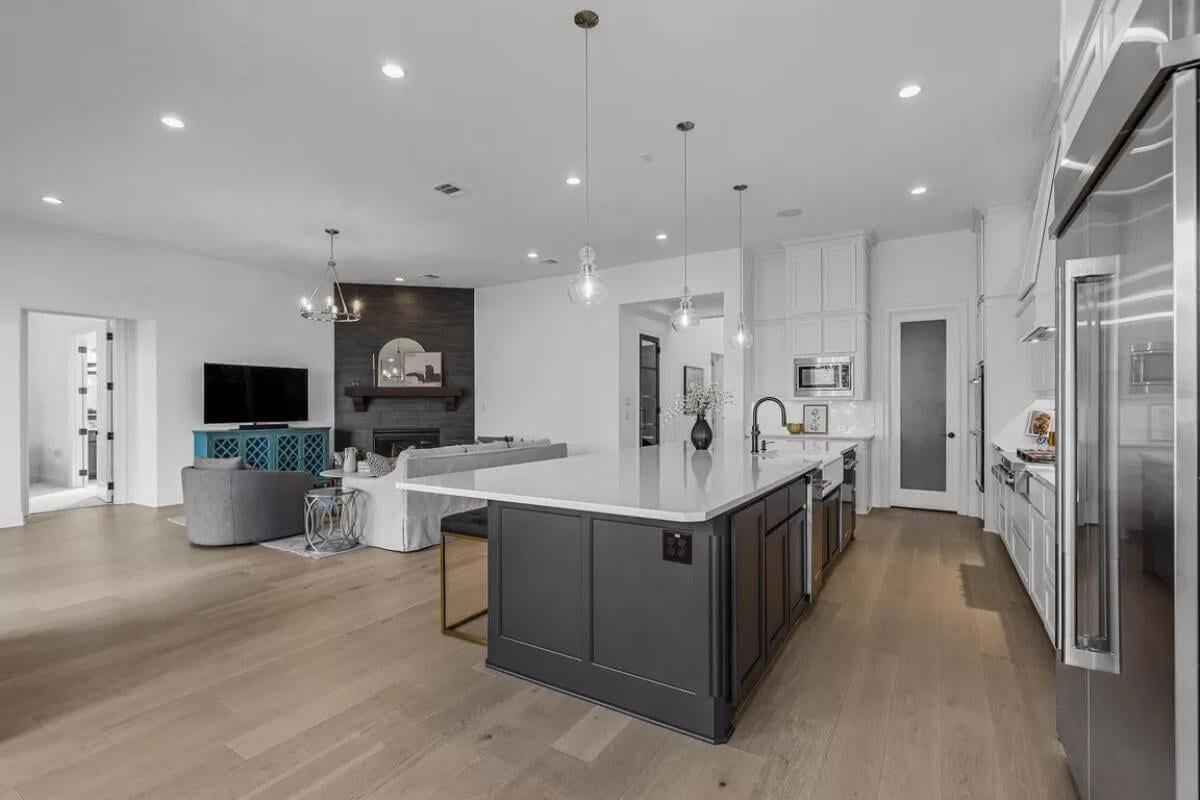 Notice the Expansive Black Island in This Open-Concept Living Space