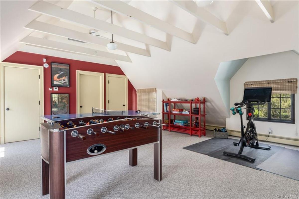 Check Out This Playful Loft with Foosball and Fitness Space