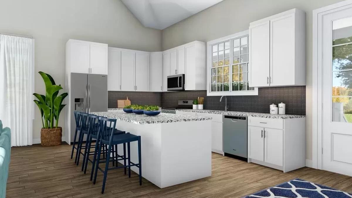 Check Out This Bright Kitchen with a Central Island and Bold Stools