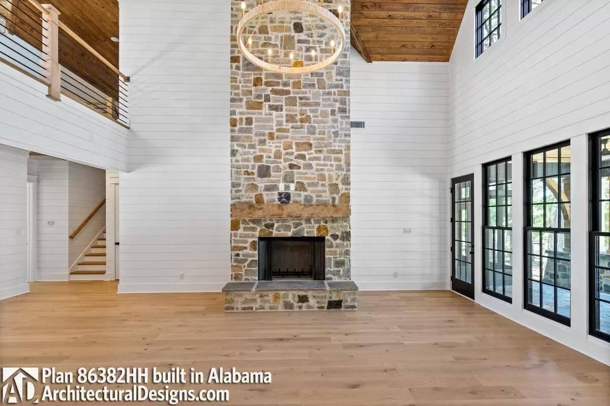Wow, Check Out This Soaring Stone Fireplace in the Living Room