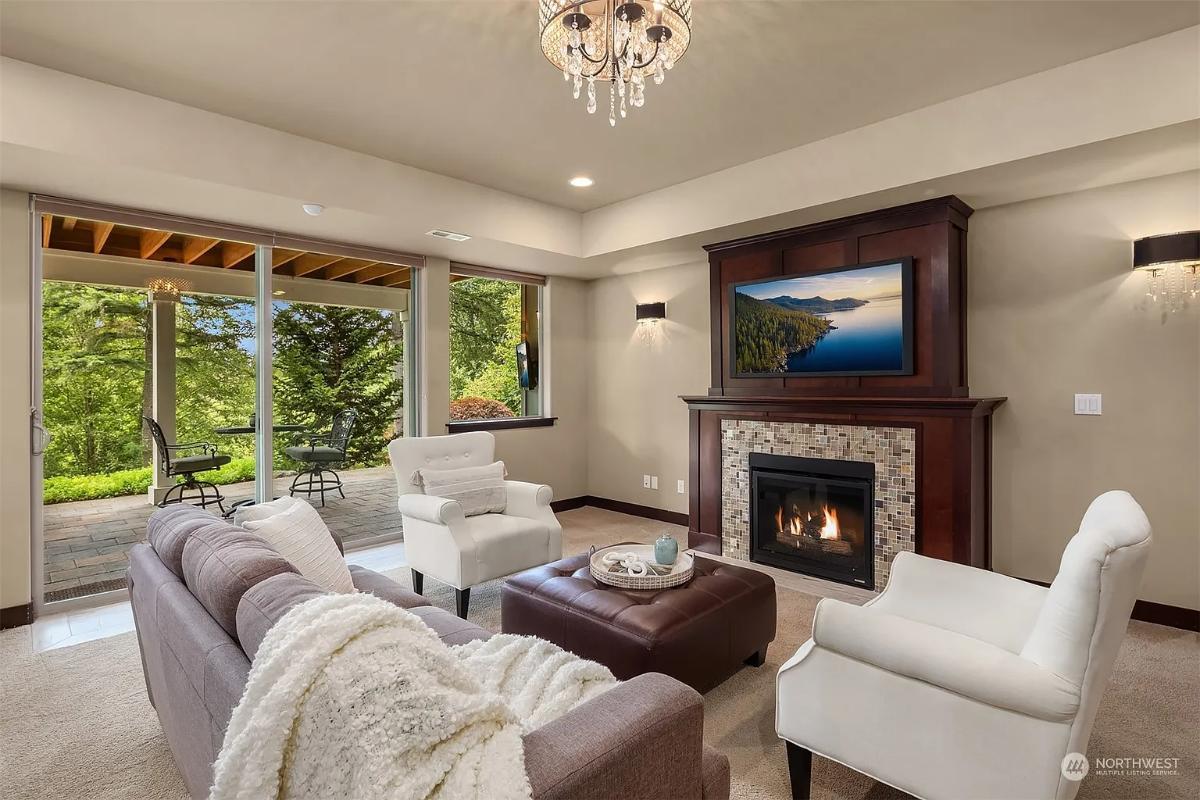 Relax by the Mosaic Tile Fireplace in This Craftsman Living Room