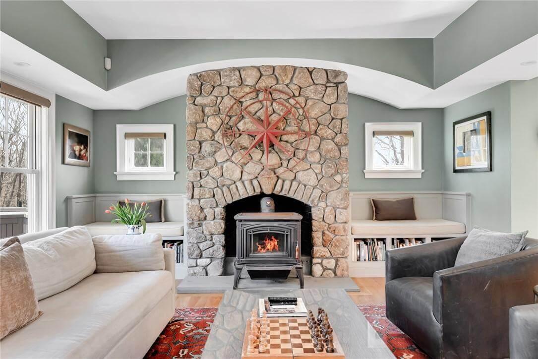Cozy Hearth with Stone Fireplace and Built-In Seating
