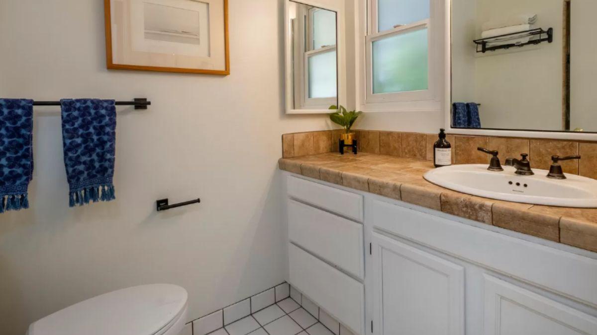 Simple Bathroom with Classic Touches and Blue Accents
