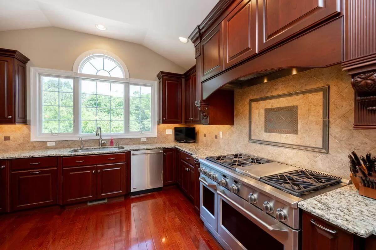 Notice the Rich Cherry Wood Cabinets Highlighted by Natural Light