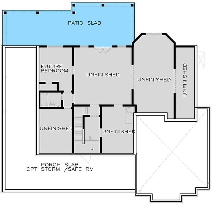Unfinished Basement with Future Bedroom and Patio Access