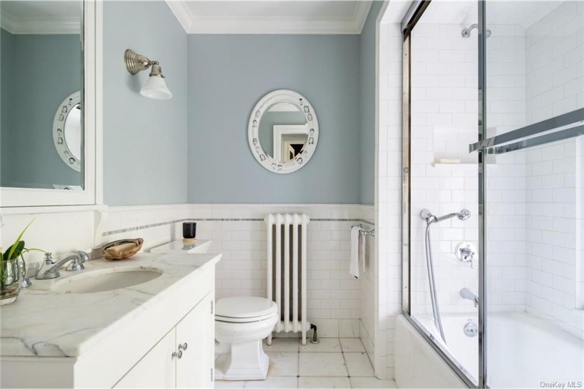 Spot the Classic Radiator and Timeless Subway Tiles in This Chic Bathroom