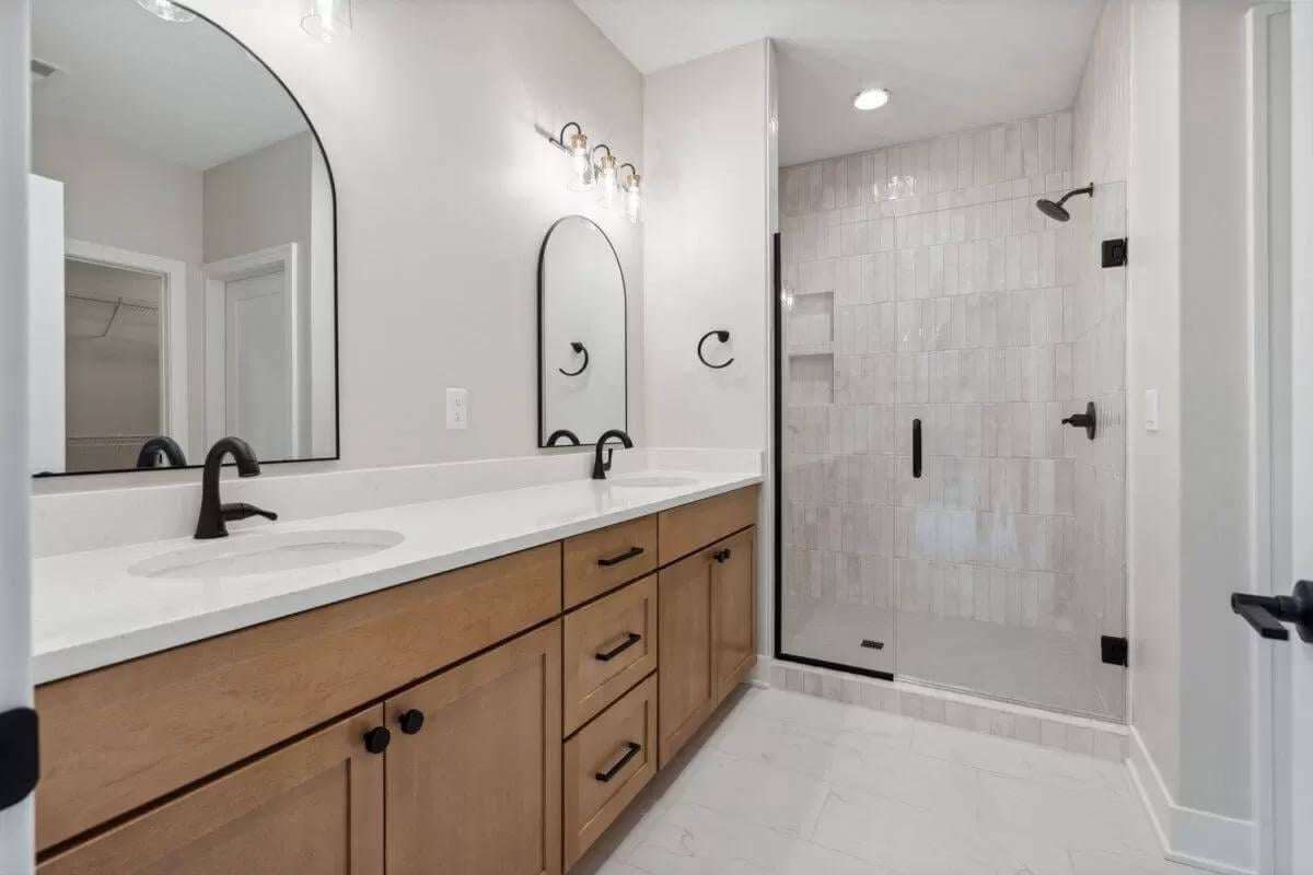 Check Out the Modern Craftsman Bathroom with Dual Vanities