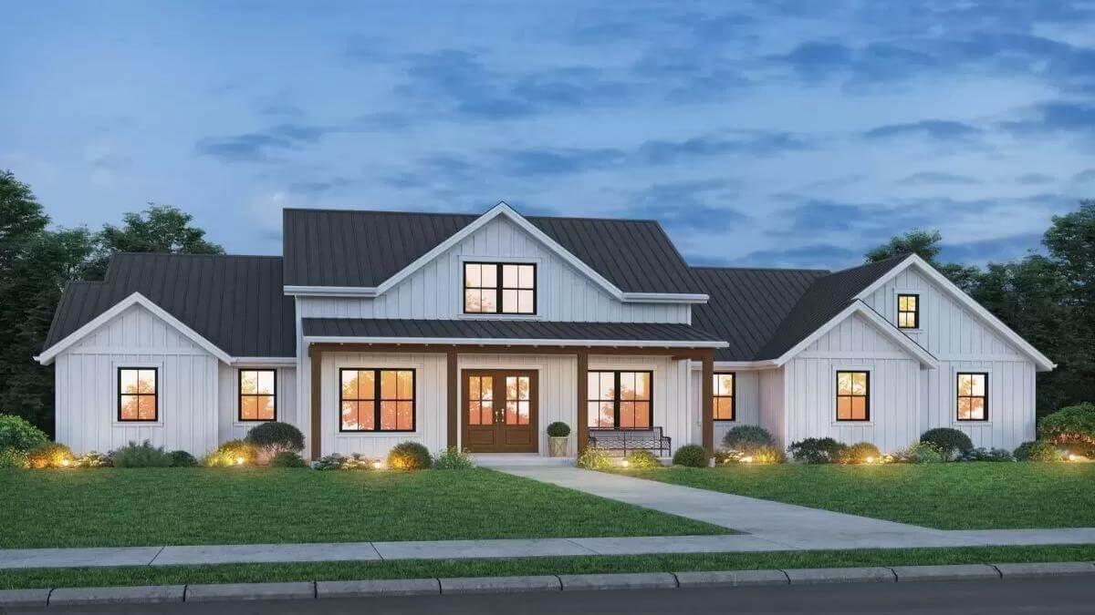 Classic White Farmhouse with Inviting Symmetry—Notice the Metal Roof