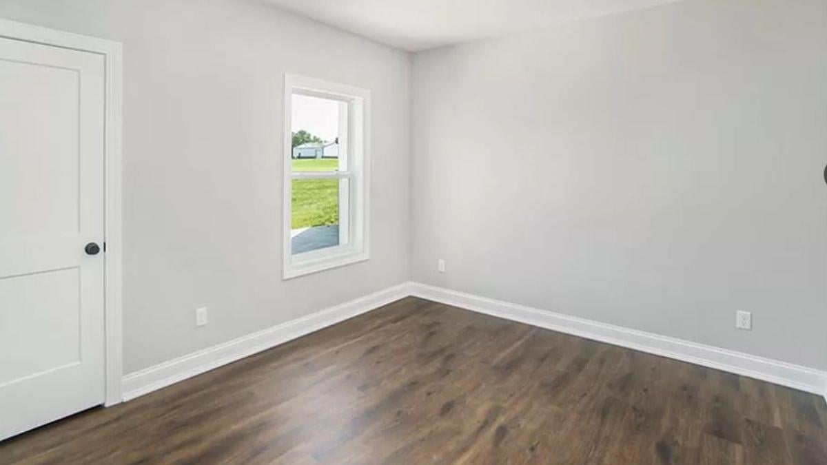 Flexible Blank Canvas with Rich Wood Floors