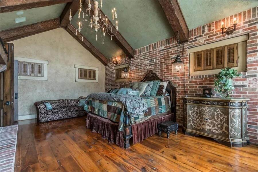 Rustic Brick Bedroom with Exposed Beams and Antique Touches
