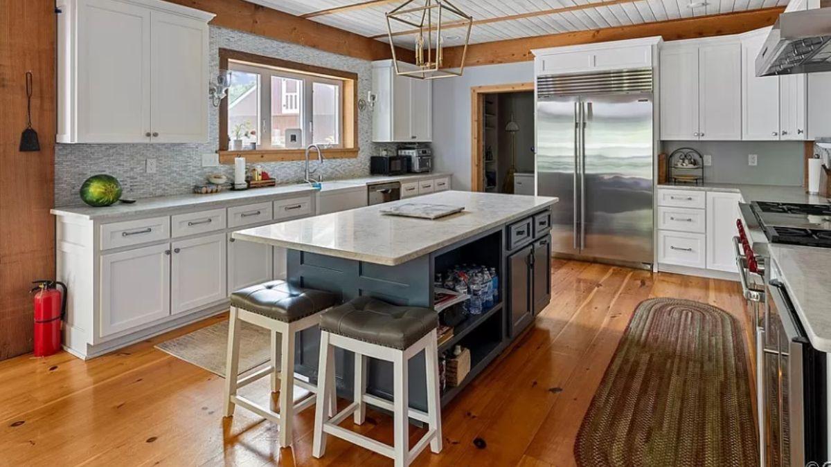 Check Out the Rich Wood Tones in This Bright Country Kitchen