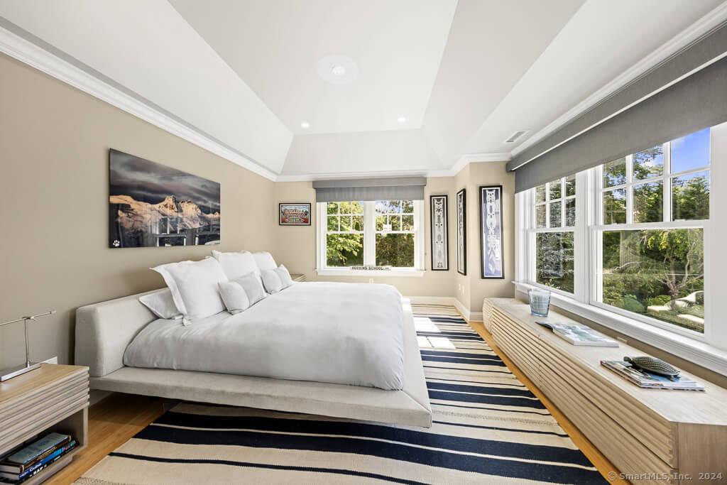 Take a Look at This Sunlit Bedroom with Vaulted Ceilings and Striking Artwork