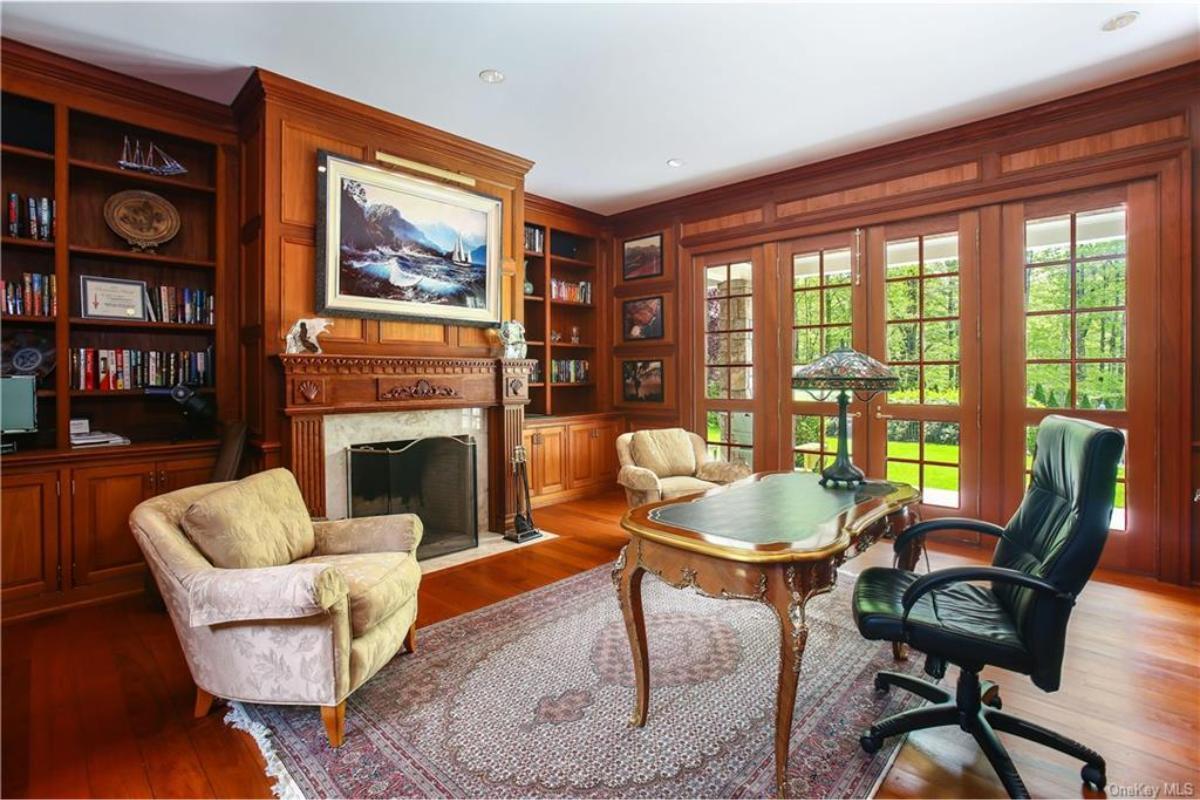 Step Into This Classic Library with Stunning Wood Paneling