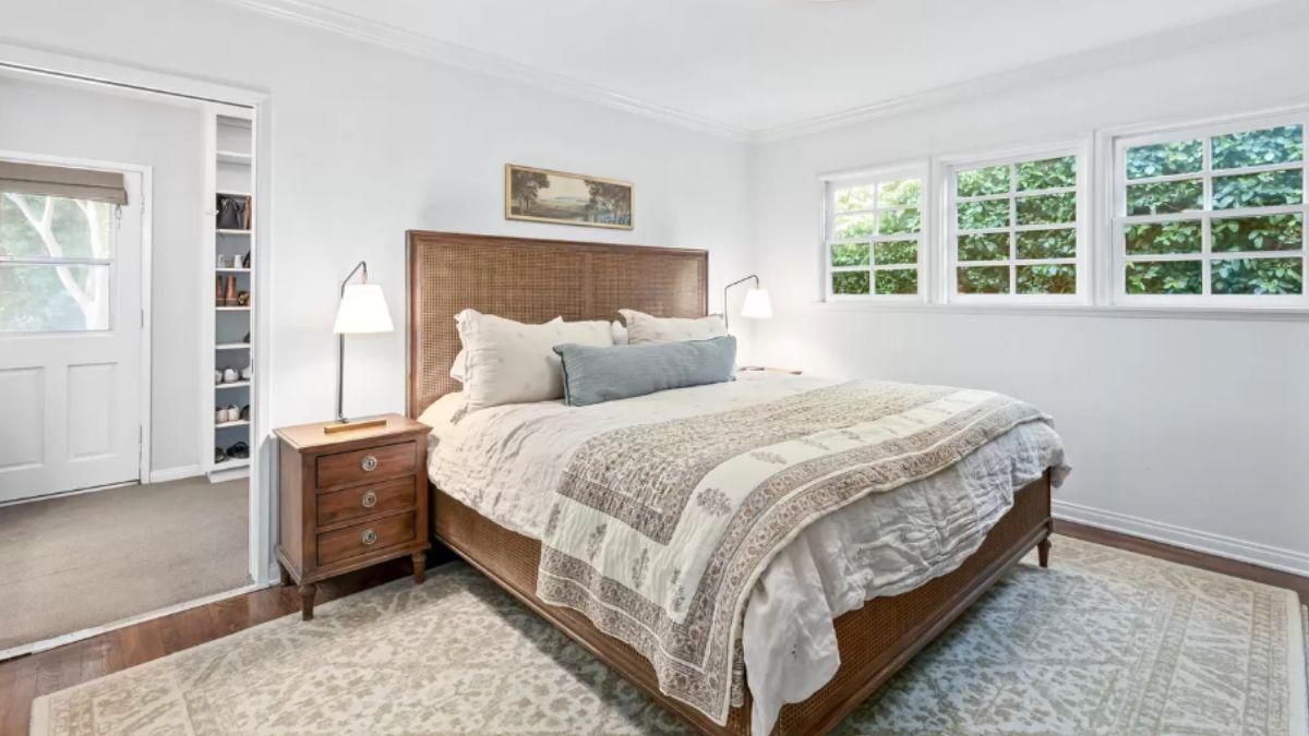 Cozy Bedroom with a Woven Headboard and a Touch of Nature