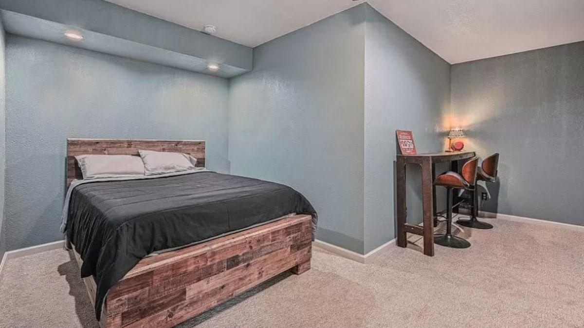 Functional Basement Retreat with Built-In Desk Area