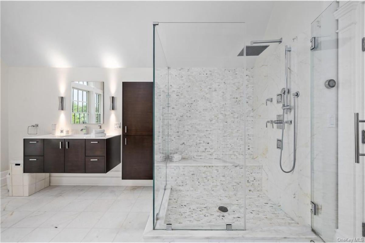 Take a Look at the Modern Floating Vanities in This Sleek Bathroom