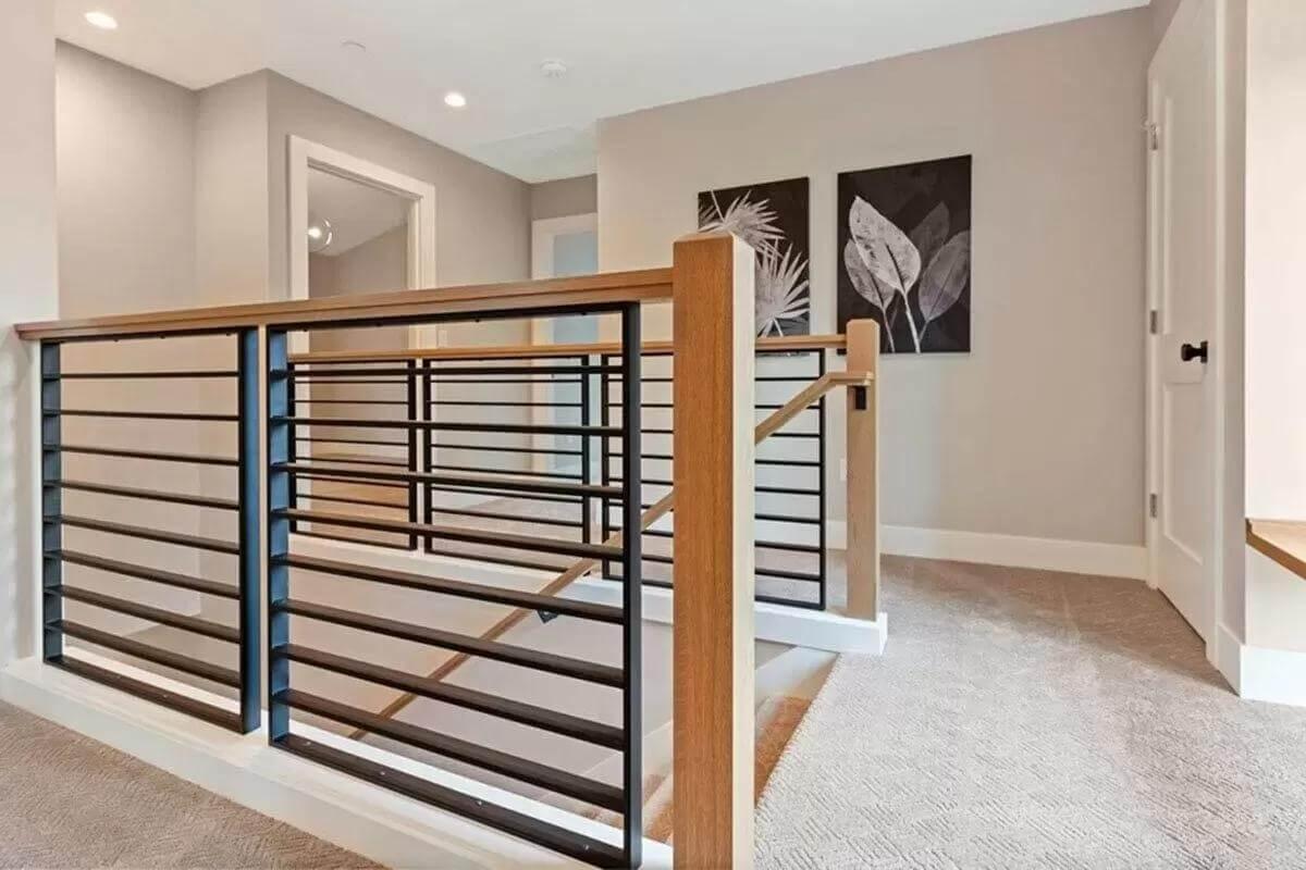 Notice the Sleek Modern Railing in This Bright Landing