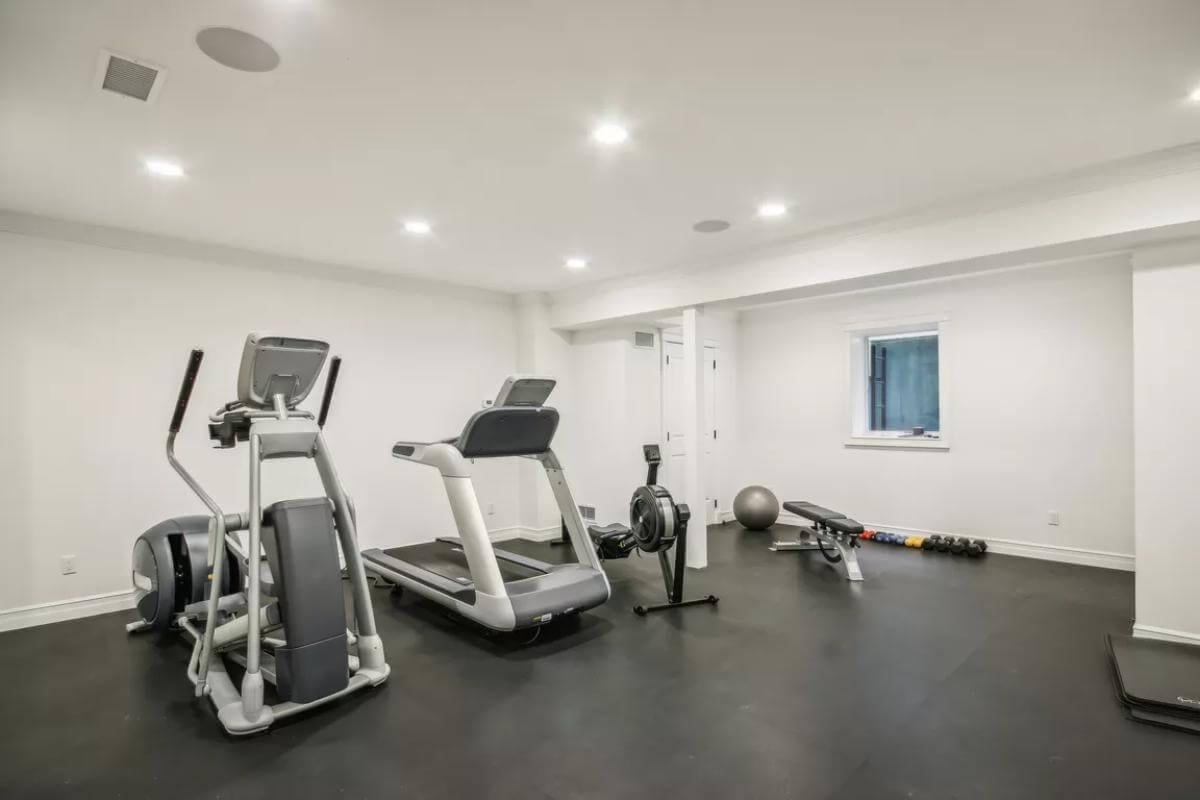 Get Moving in This Sleek Home Gym with Top-Notch Equipment